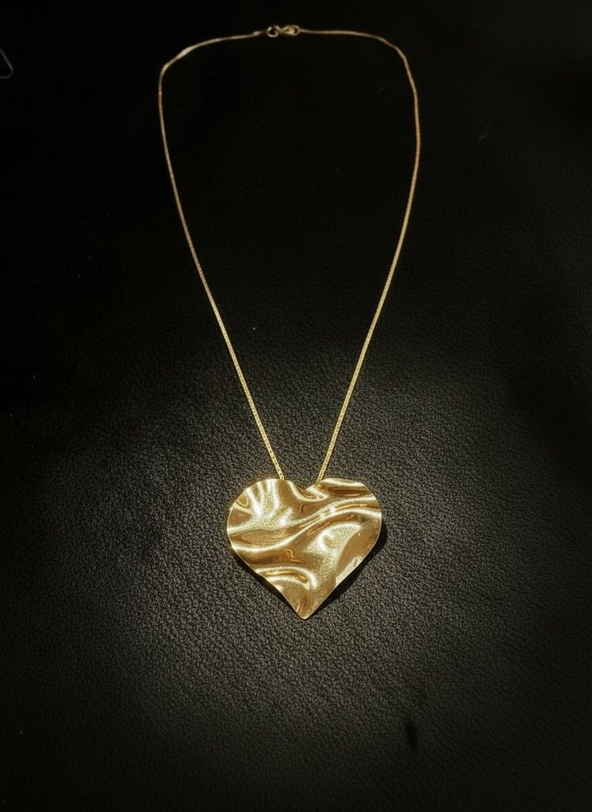 Collar con corazón enchape oro